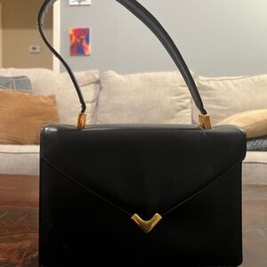 Koret Black Shoulder Bag with Gold V Accent